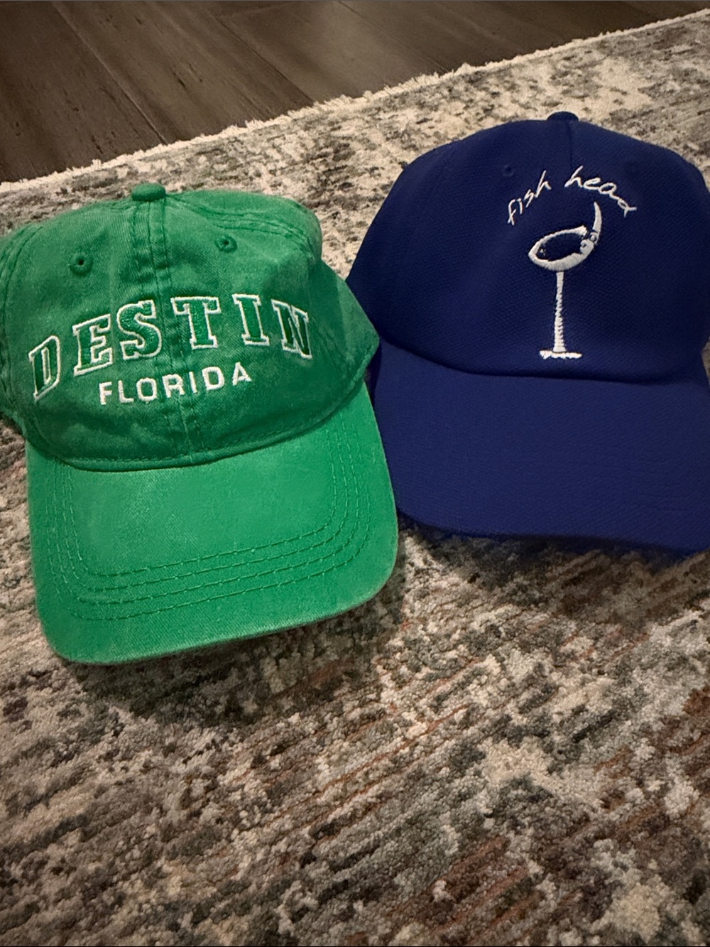 Women’s beach ball caps never worn- one green one purple